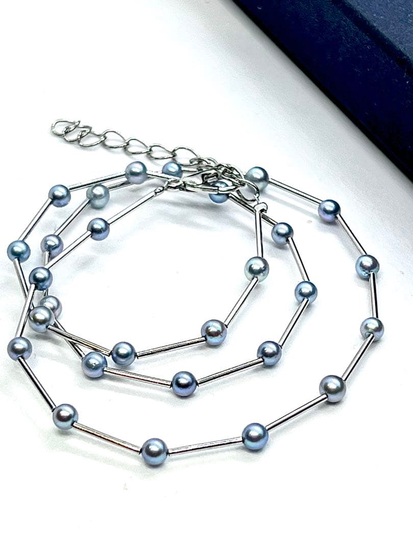 Akoya Pearl Indigo Blue Baby Pearl Station Necklace with silver parts and alloy clasp on white background