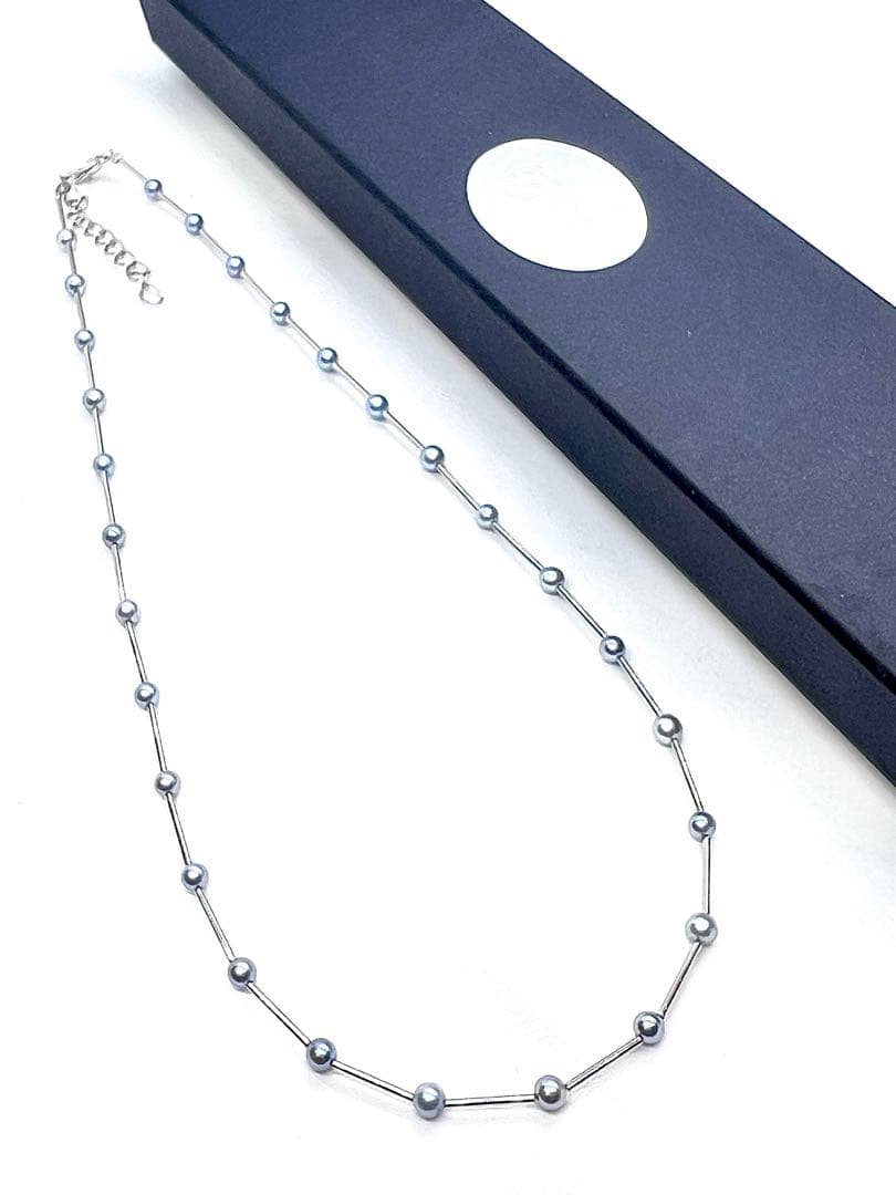 Akoya Pearl Indigo Blue Baby Pearl Station Necklace with silver parts and alloy clasp on white background
