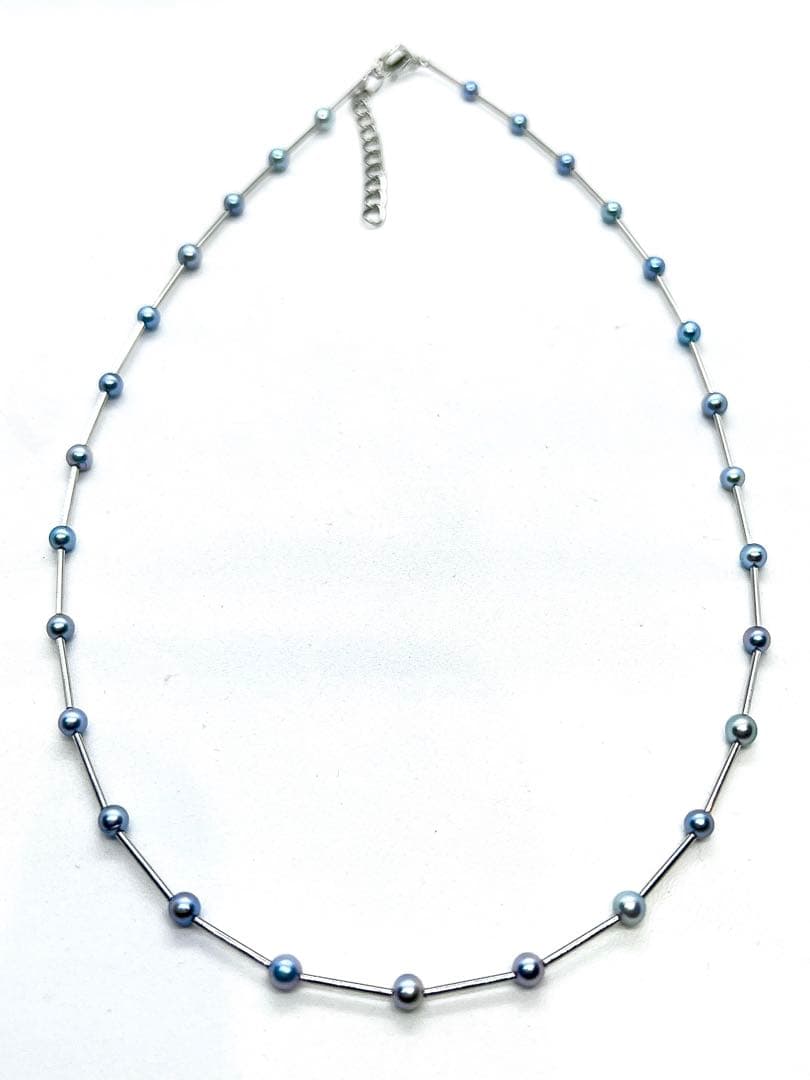Akoya Pearl Indigo Blue Baby Pearl Station Necklace with silver parts and alloy clasp on white background