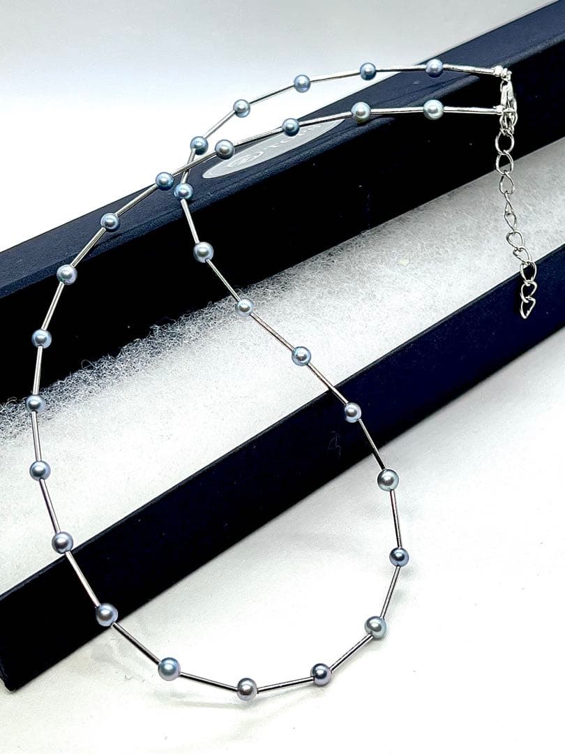 Akoya Pearl Indigo Blue Baby Pearl Station Necklace with silver parts and alloy clasp on white background
