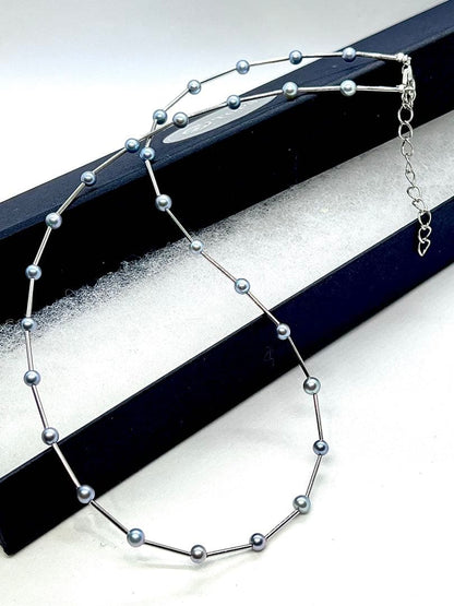 Akoya Pearl Indigo Blue Baby Pearl Station Necklace with silver parts and alloy clasp on white background