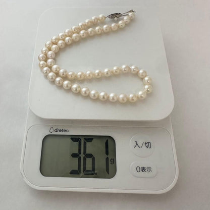 Akoya pearl necklace 7.5-8mm with silver clasp displayed with certificate and case