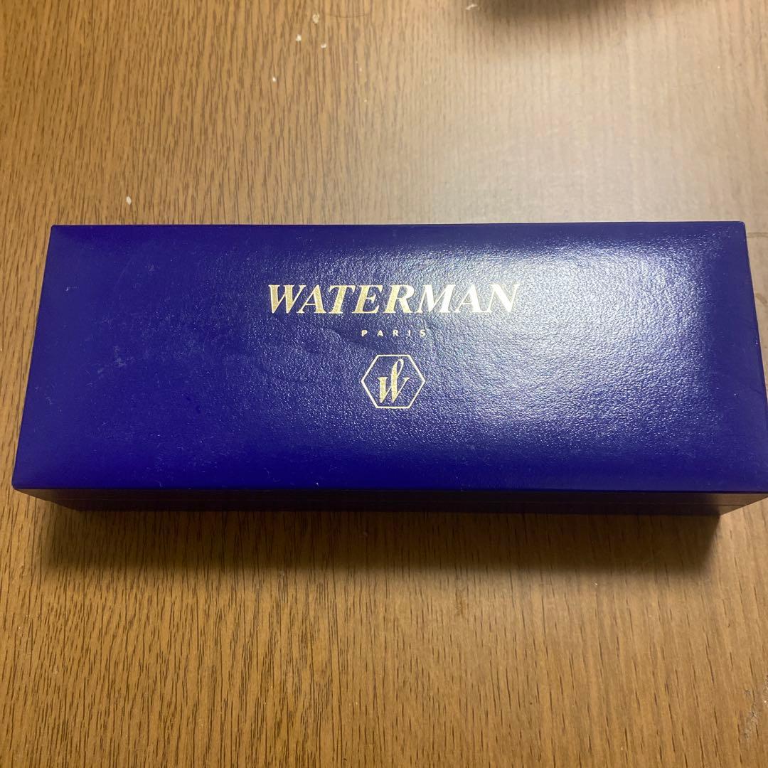Waterman blue ballpoint pen with sleek silver accents and matching dedicated case on a white background