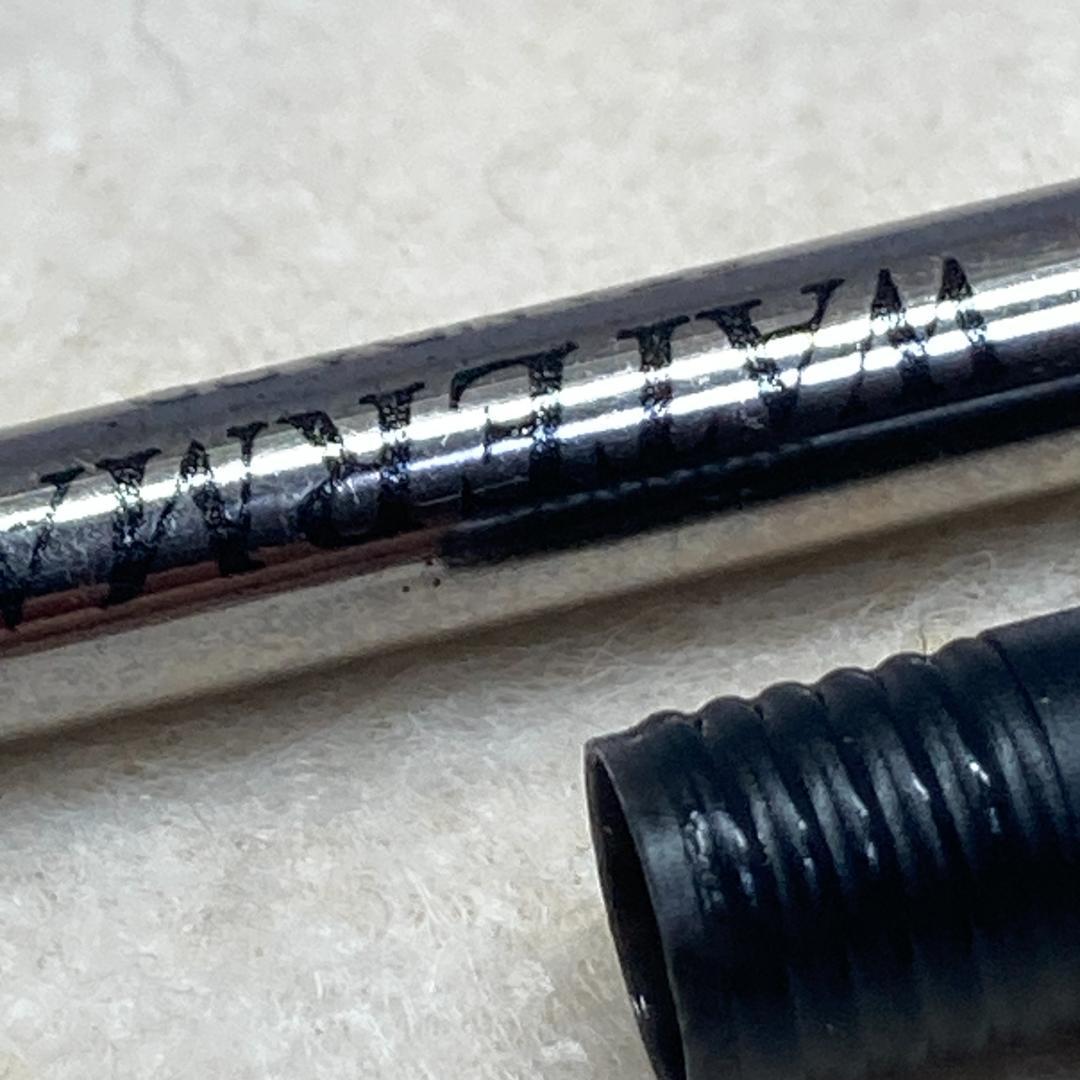 Waterman ballpoint pen with silver metal body, twist mechanism, black ink, and matching silver case