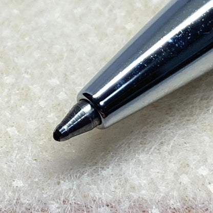 Waterman ballpoint pen with silver metal body, twist mechanism, black ink, and matching silver case