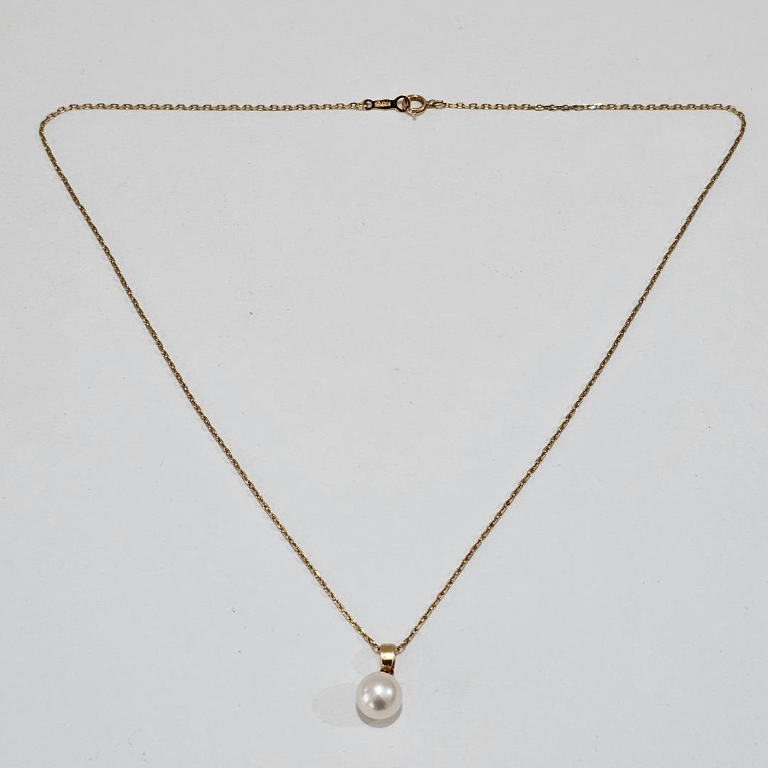 1880 Mikimoto pearl necklace with 7.6mm pearls on 18K yellow gold 40cm chain
