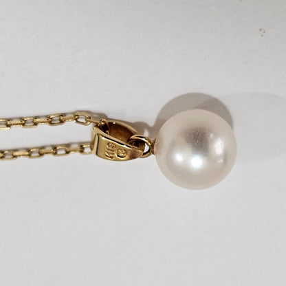 1880 Mikimoto pearl necklace with 7.6mm pearls on 18K yellow gold 40cm chain