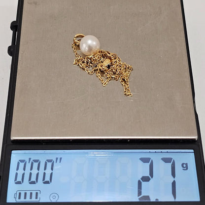 1880 Mikimoto pearl necklace with 7.6mm pearls on 18K yellow gold 40cm chain