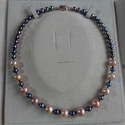 Law pearl necklace 44.5 cm long with 6 to 11 mm sized pearls displayed on white background