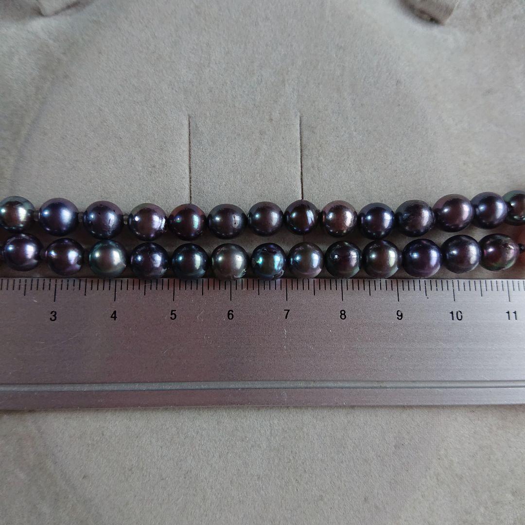 Law pearl necklace 44.5 cm long with 6 to 11 mm sized pearls displayed on white background