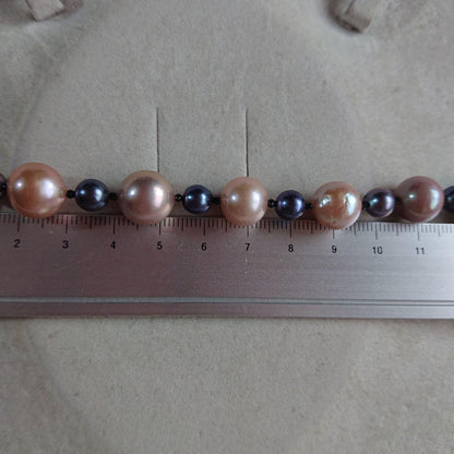 Law pearl necklace 44.5 cm long with 6 to 11 mm sized pearls displayed on white background