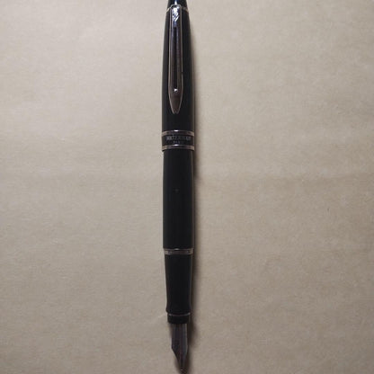 WATERMAN Expert Black Fountain Pen made of black resin with silver accents, shown capped