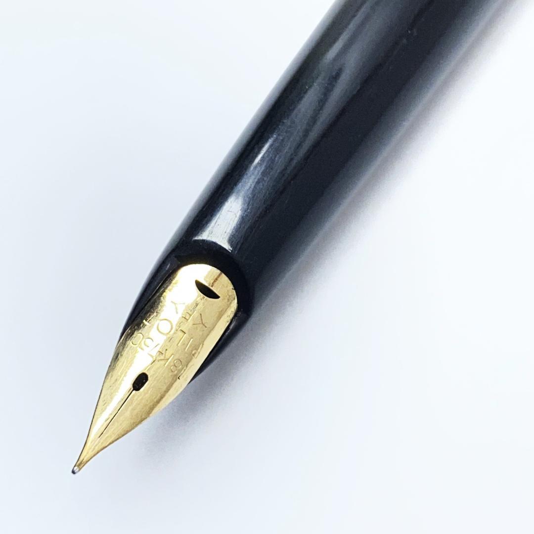PILOT Elite Fountain Pen with 18K-750 fine tip, sleek black body, and polished gold accents