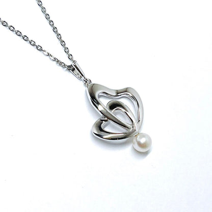 Mikimoto pearl double heart necklace with 4.9mm pearls on a 40cm silver chain