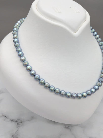 Akoya black pearl necklace featuring 7mm light peacock South Sea pearls with silver clasp, 42.3 cm length