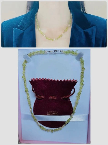 Pink Aurora Akoya Pearl necklace featuring 7 baby pearls and peridot stones with silver clasp