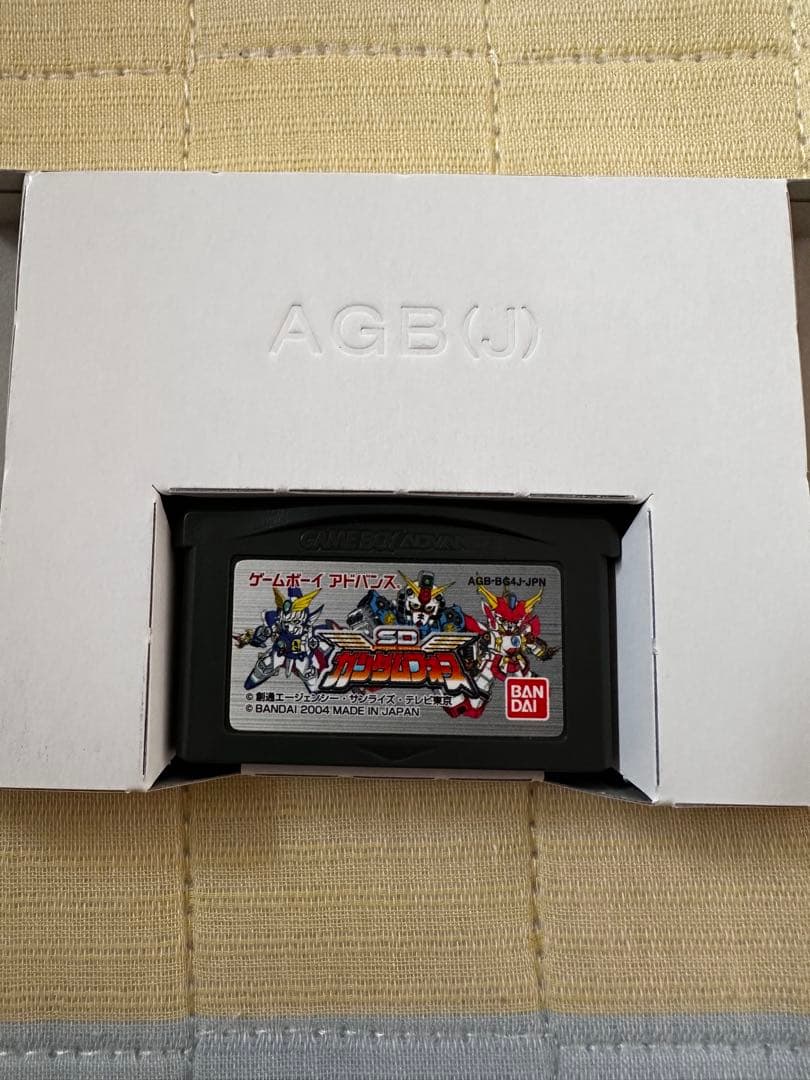 Used Game Boy Advance cartridge of SD Gundam Force with label showing game title and artwork