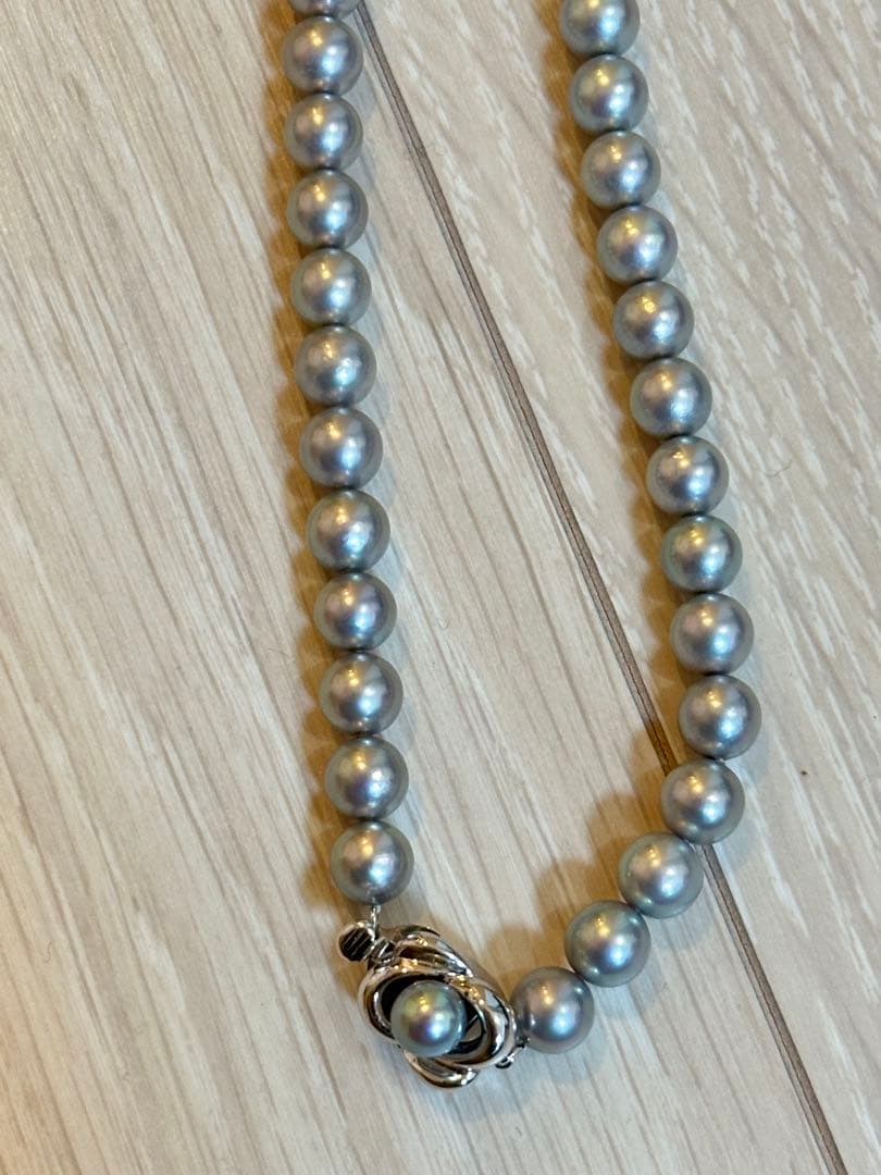 TASAKI Akoya Pearl Necklace featuring 7 mm pearls on a 42.5 cm chain with warranty
