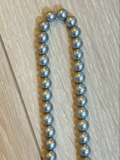 TASAKI Akoya Pearl Necklace featuring 7 mm pearls on a 42.5 cm chain with warranty