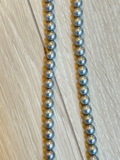 TASAKI Akoya Pearl Necklace featuring 7 mm pearls on a 42.5 cm chain with warranty