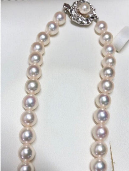 Matsuzakaya Akoya pearl necklace with 6.5-7.0mm pearls and matching 6.7mm k14wg earrings