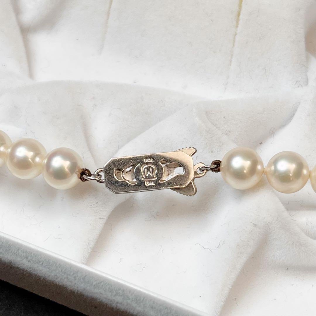MIKIMOTO K14WG pearl necklace with 7.1 to 7.5mm pearls measuring about 41 inches with a K14WG clasp marked M