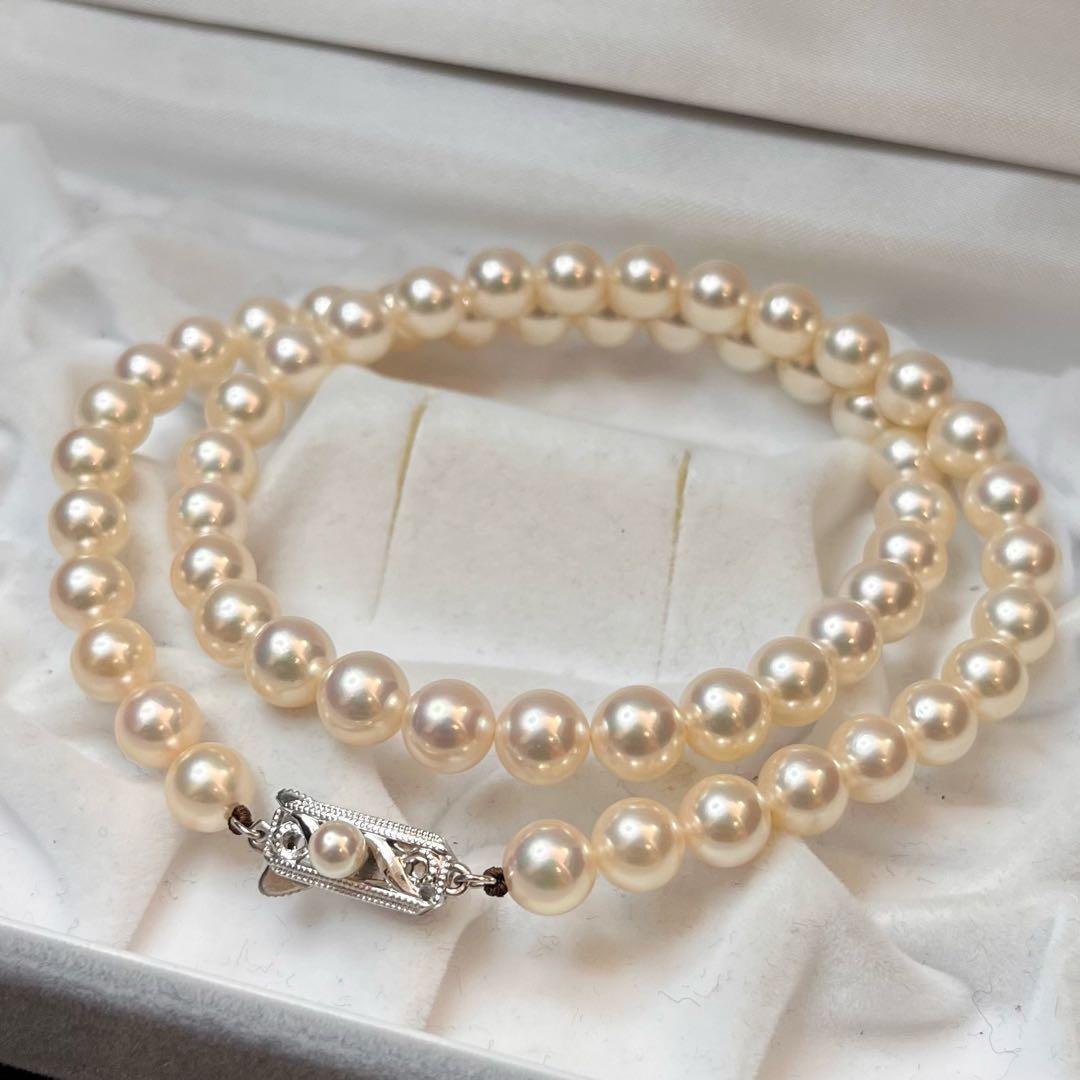 MIKIMOTO K14WG pearl necklace with 7.1 to 7.5mm pearls measuring about 41 inches with a K14WG clasp marked M