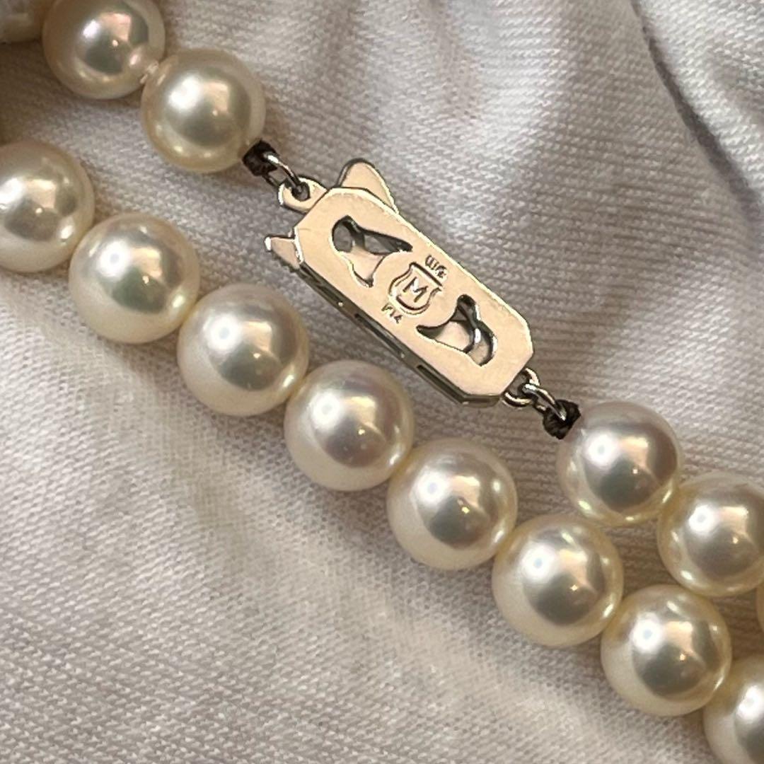 MIKIMOTO K14WG pearl necklace with 7.1 to 7.5mm pearls measuring about 41 inches with a K14WG clasp marked M