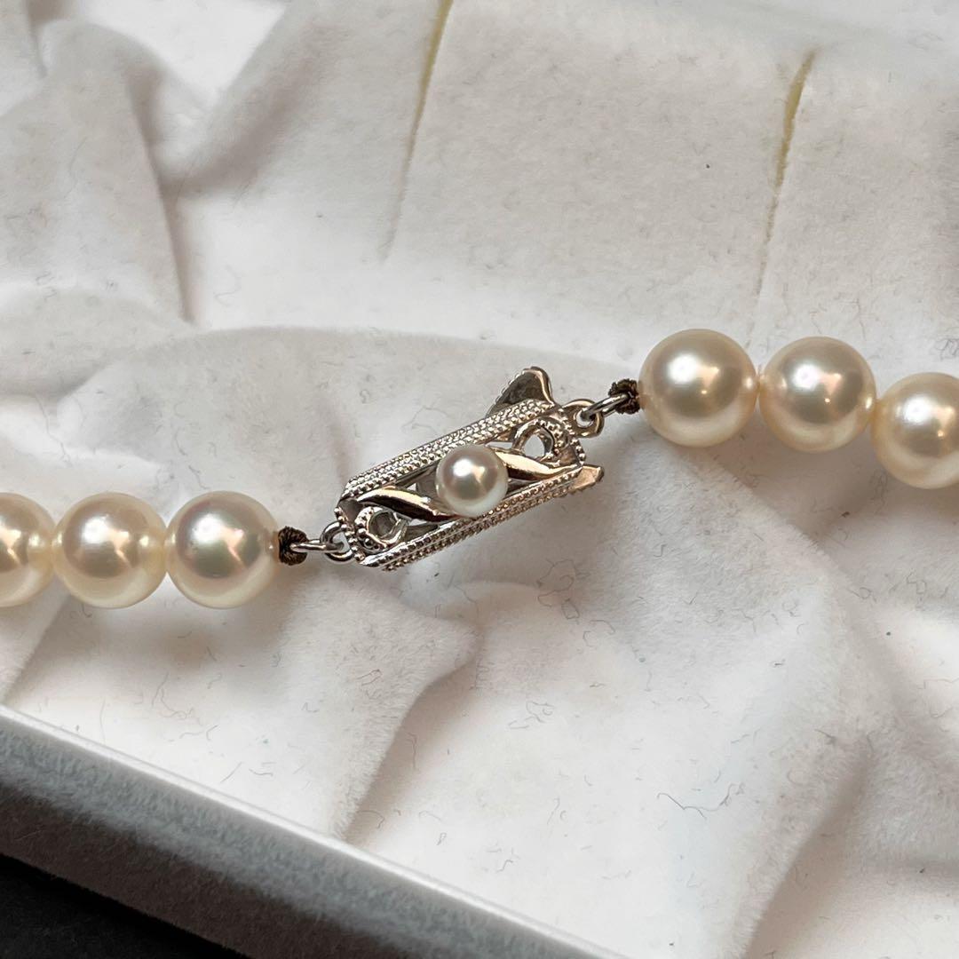MIKIMOTO K14WG pearl necklace with 7.1 to 7.5mm pearls measuring about 41 inches with a K14WG clasp marked M