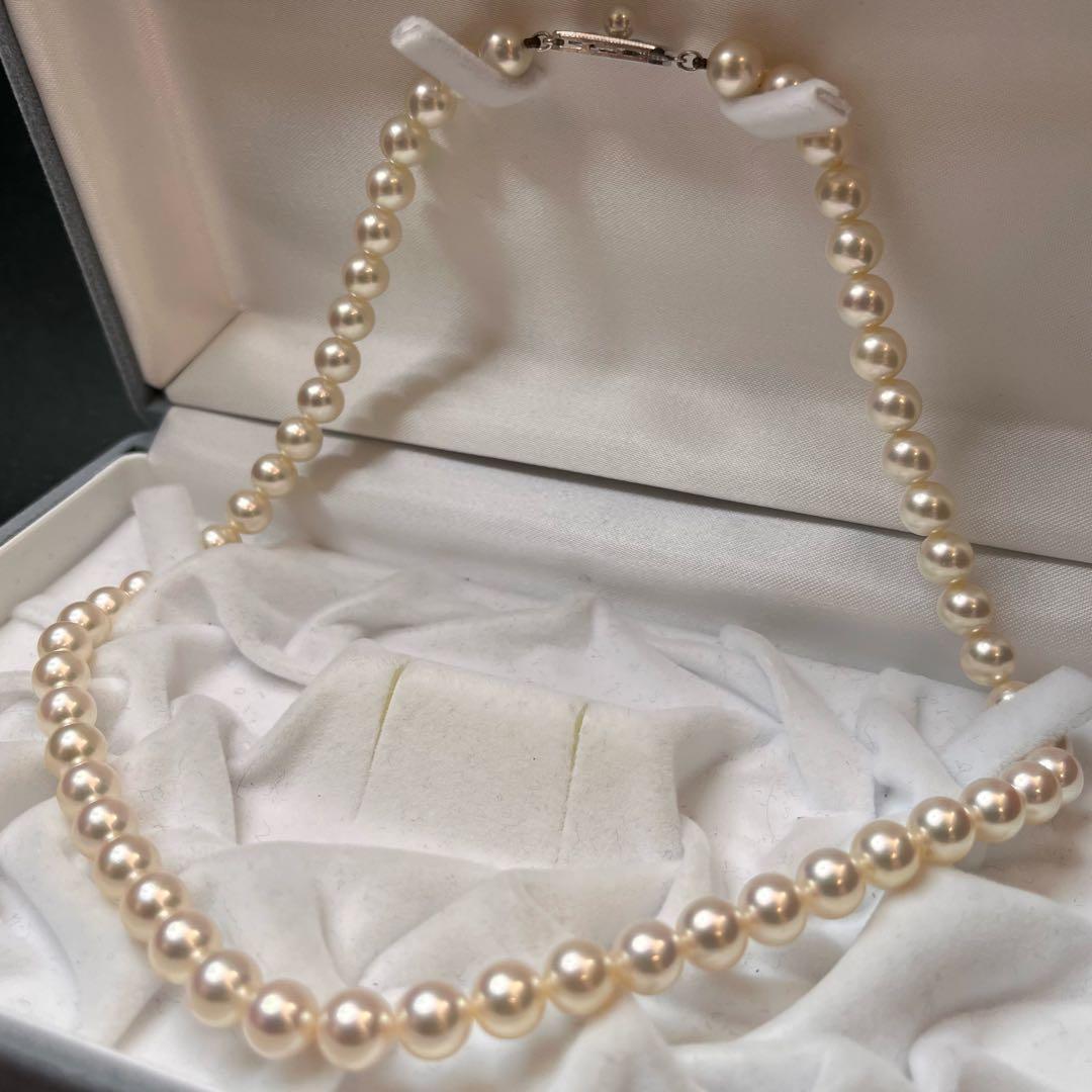 MIKIMOTO K14WG pearl necklace with 7.1 to 7.5mm pearls measuring about 41 inches with a K14WG clasp marked M