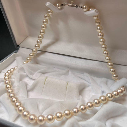MIKIMOTO K14WG pearl necklace with 7.1 to 7.5mm pearls measuring about 41 inches with a K14WG clasp marked M