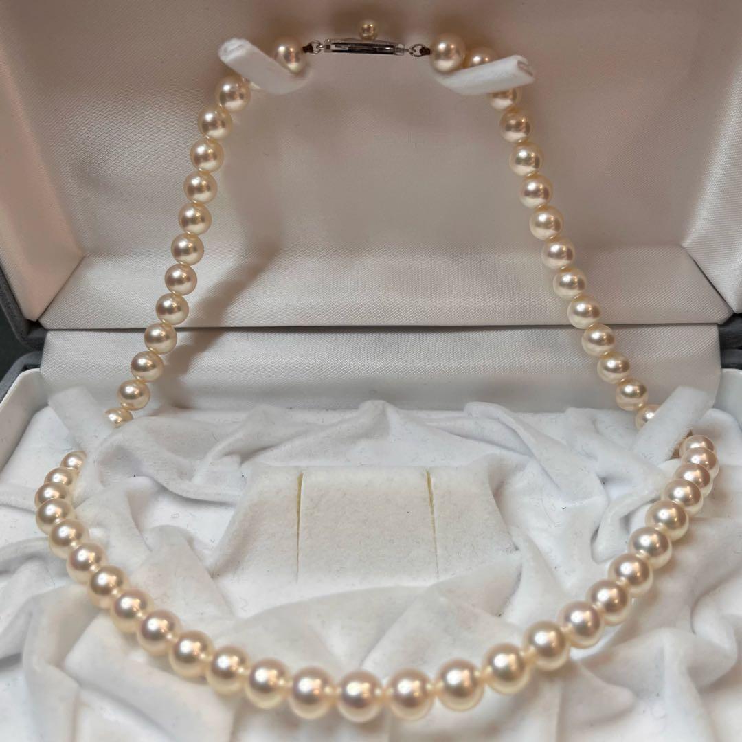 MIKIMOTO K14WG pearl necklace with 7.1 to 7.5mm pearls measuring about 41 inches with a K14WG clasp marked M
