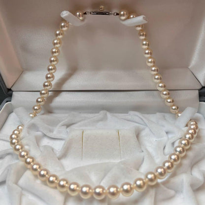 MIKIMOTO K14WG pearl necklace with 7.1 to 7.5mm pearls measuring about 41 inches with a K14WG clasp marked M