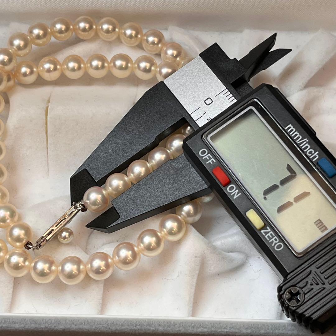 MIKIMOTO K14WG pearl necklace with 7.1 to 7.5mm pearls measuring about 41 inches with a K14WG clasp marked M