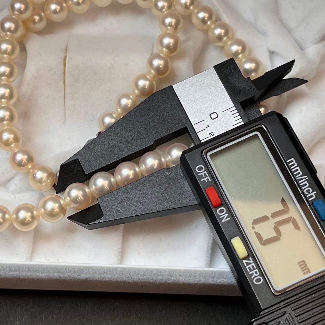 MIKIMOTO K14WG pearl necklace with 7.1 to 7.5mm pearls measuring about 41 inches with a K14WG clasp marked M