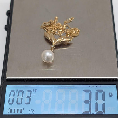 Mikimoto pearl diamond necklace with 7.5mm pearl pendant in 18K yellow gold on 40cm chain