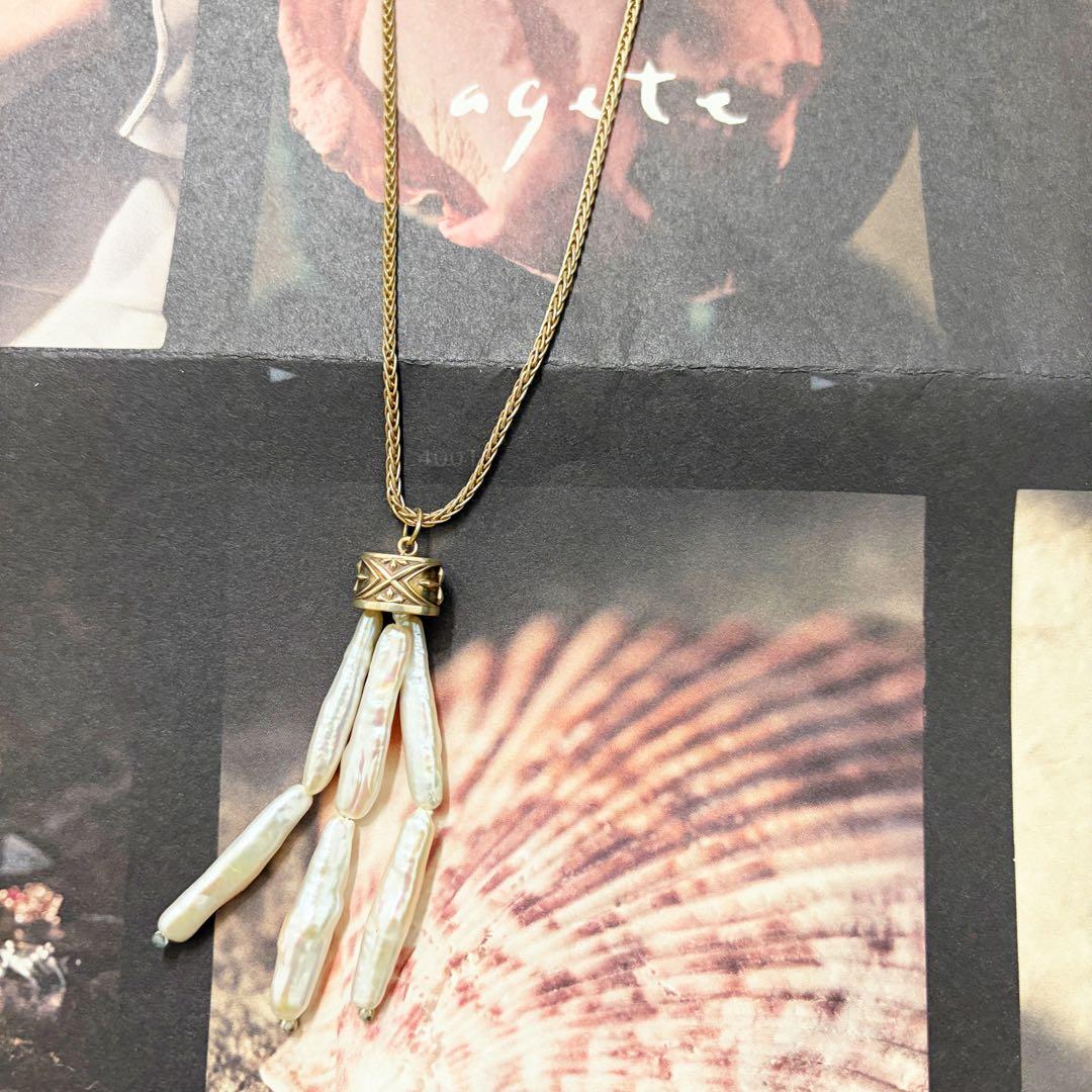 Agete necklace charm with stick-shaped freshwater pearls, silver chain, labradorite stone, and tassel
