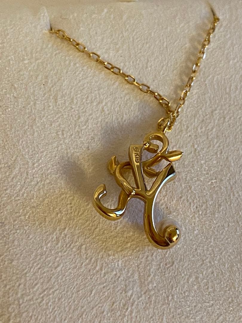 MIKIMOTO K18 necklace featuring a single pearl on a delicate gold chain