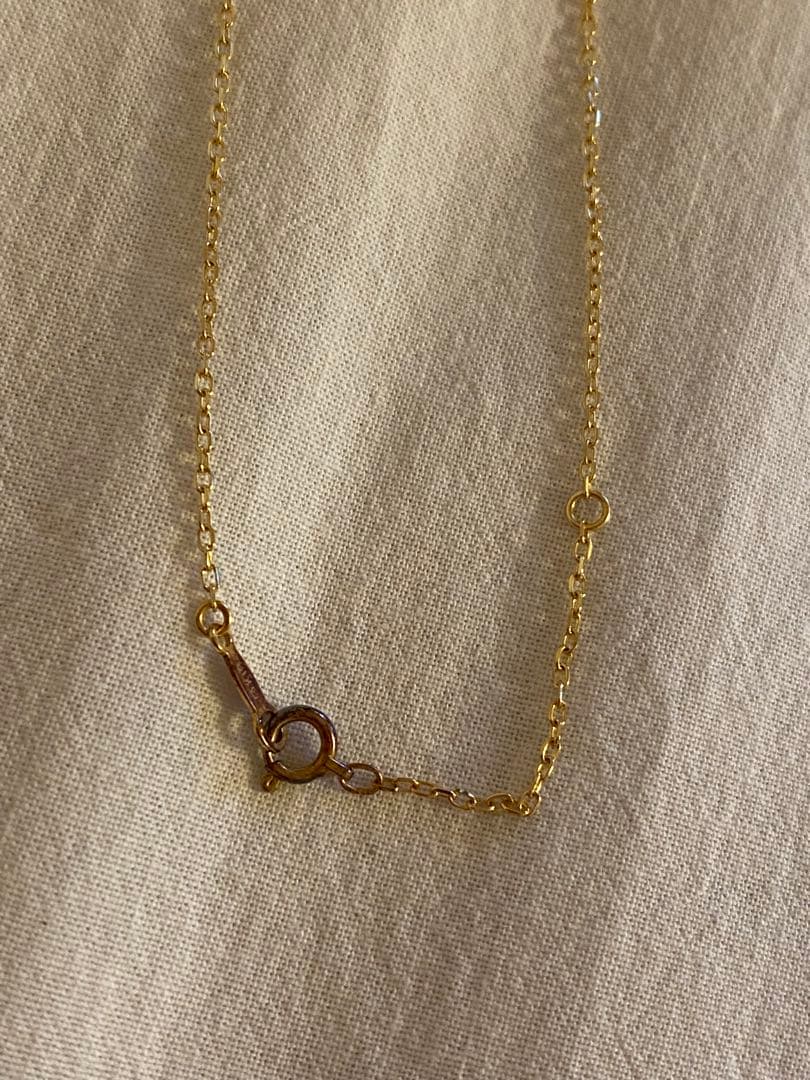 MIKIMOTO K18 necklace featuring a single pearl on a delicate gold chain