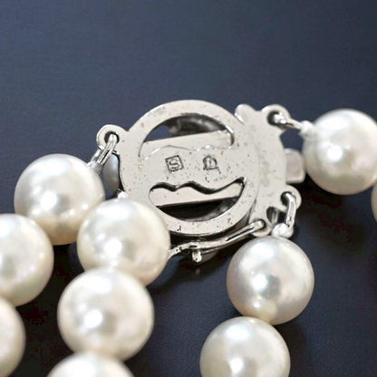 Double strand Tasaki Akoya pearl necklace with round 6.1-6.3 mm pearls and silver clasp