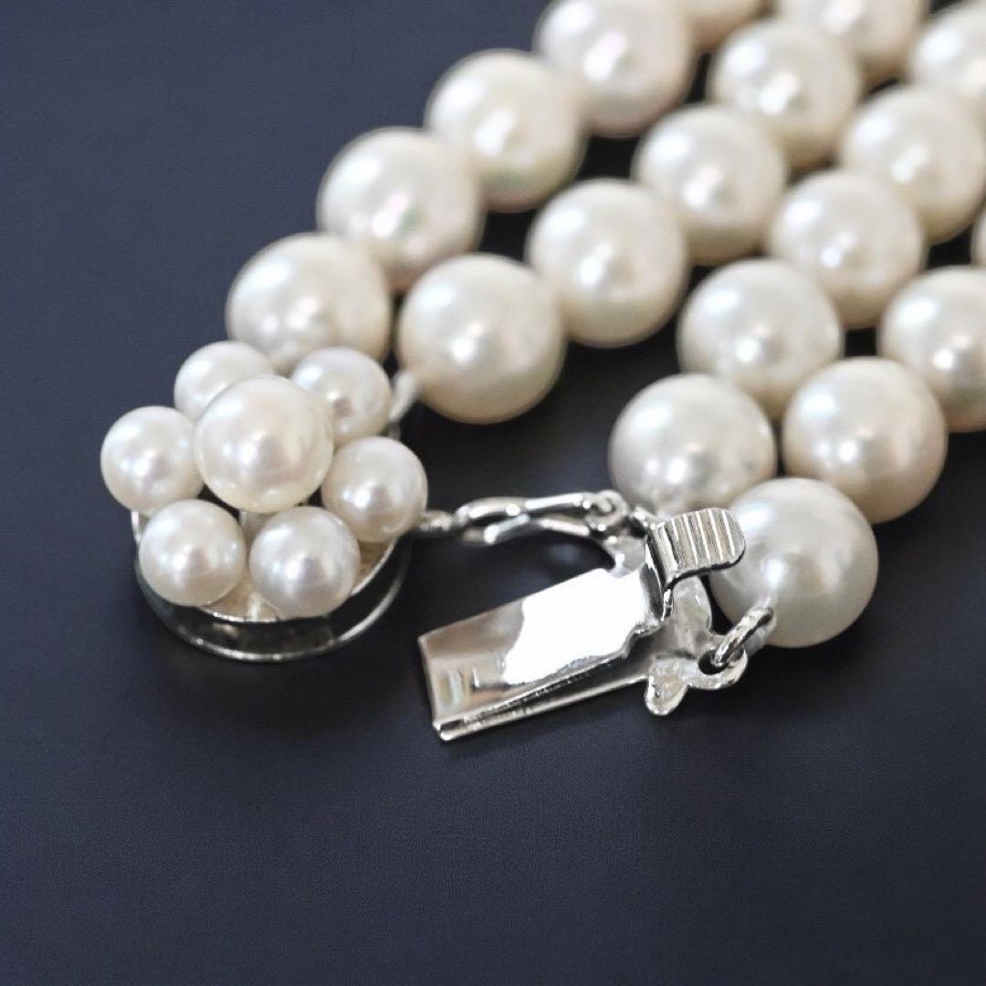 Double strand Tasaki Akoya pearl necklace with round 6.1-6.3 mm pearls and silver clasp