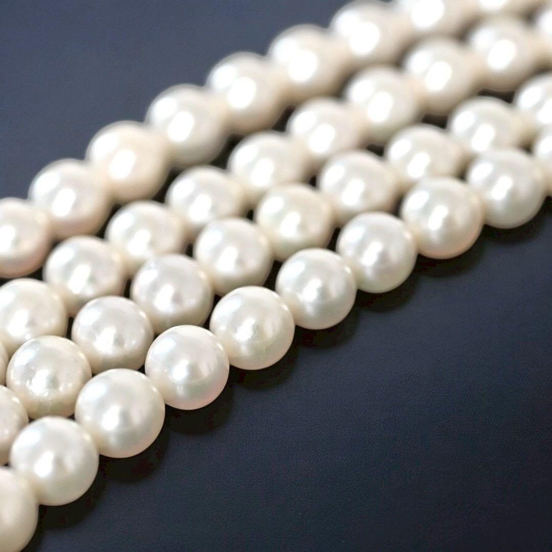 Double strand Tasaki Akoya pearl necklace with round 6.1-6.3 mm pearls and silver clasp