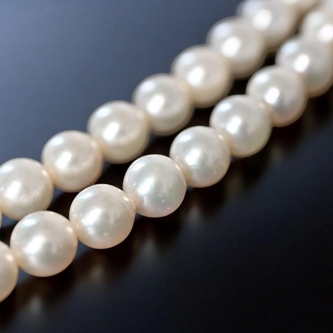 Double strand Tasaki Akoya pearl necklace with round 6.1-6.3 mm pearls and silver clasp
