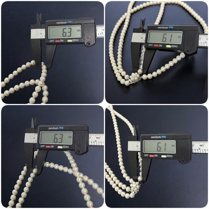 Double strand Tasaki Akoya pearl necklace with round 6.1-6.3 mm pearls and silver clasp