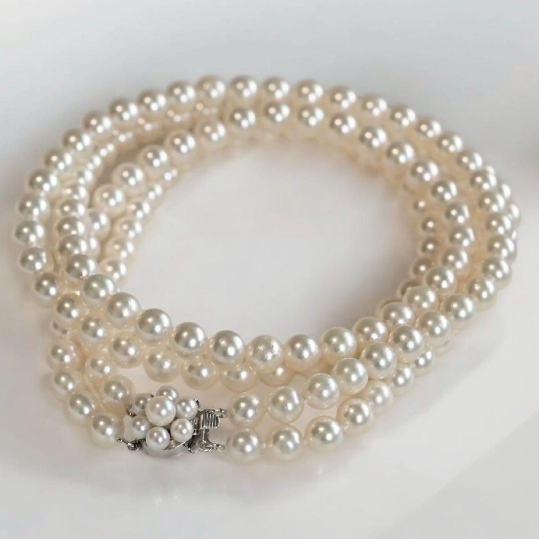 Double strand Tasaki Akoya pearl necklace with round 6.1-6.3 mm pearls and silver clasp