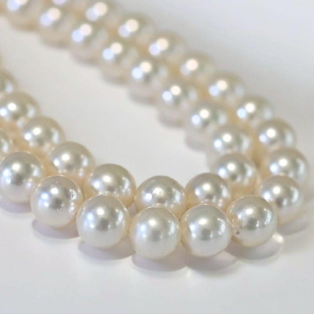 Double strand Tasaki Akoya pearl necklace with round 6.1-6.3 mm pearls and silver clasp