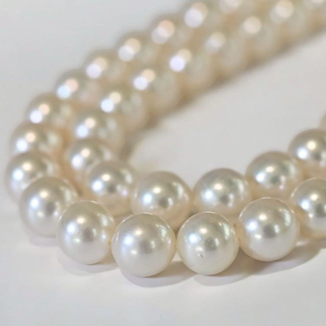 Double strand Tasaki Akoya pearl necklace with round 6.1-6.3 mm pearls and silver clasp