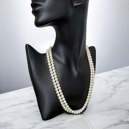 Double strand Tasaki Akoya pearl necklace with round 6.1-6.3 mm pearls and silver clasp