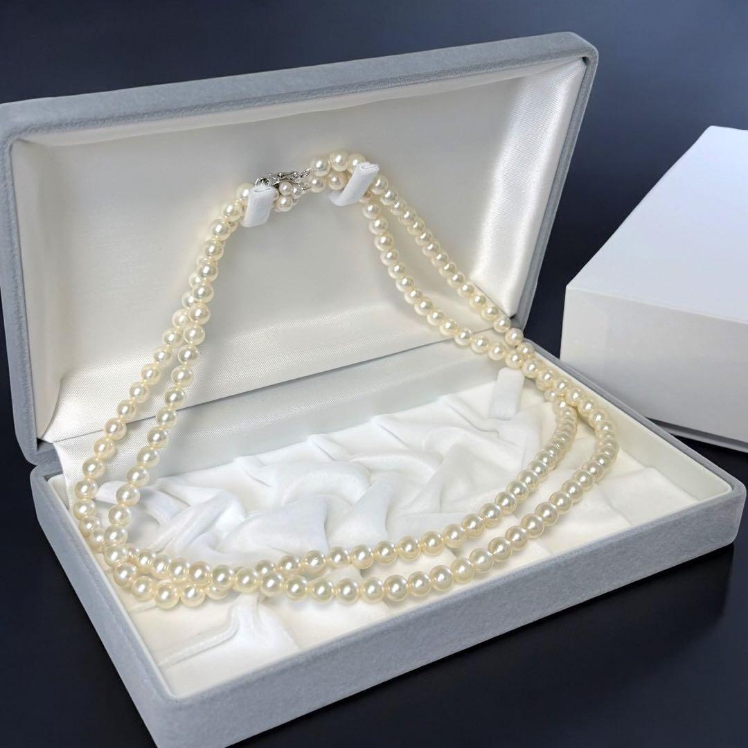 Double strand Tasaki Akoya pearl necklace with round 6.1-6.3 mm pearls and silver clasp