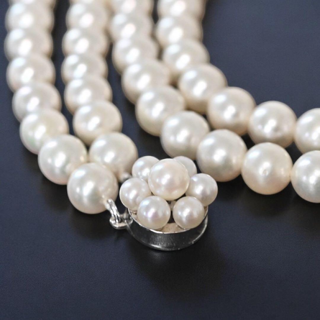 Double strand Tasaki Akoya pearl necklace with round 6.1-6.3 mm pearls and silver clasp